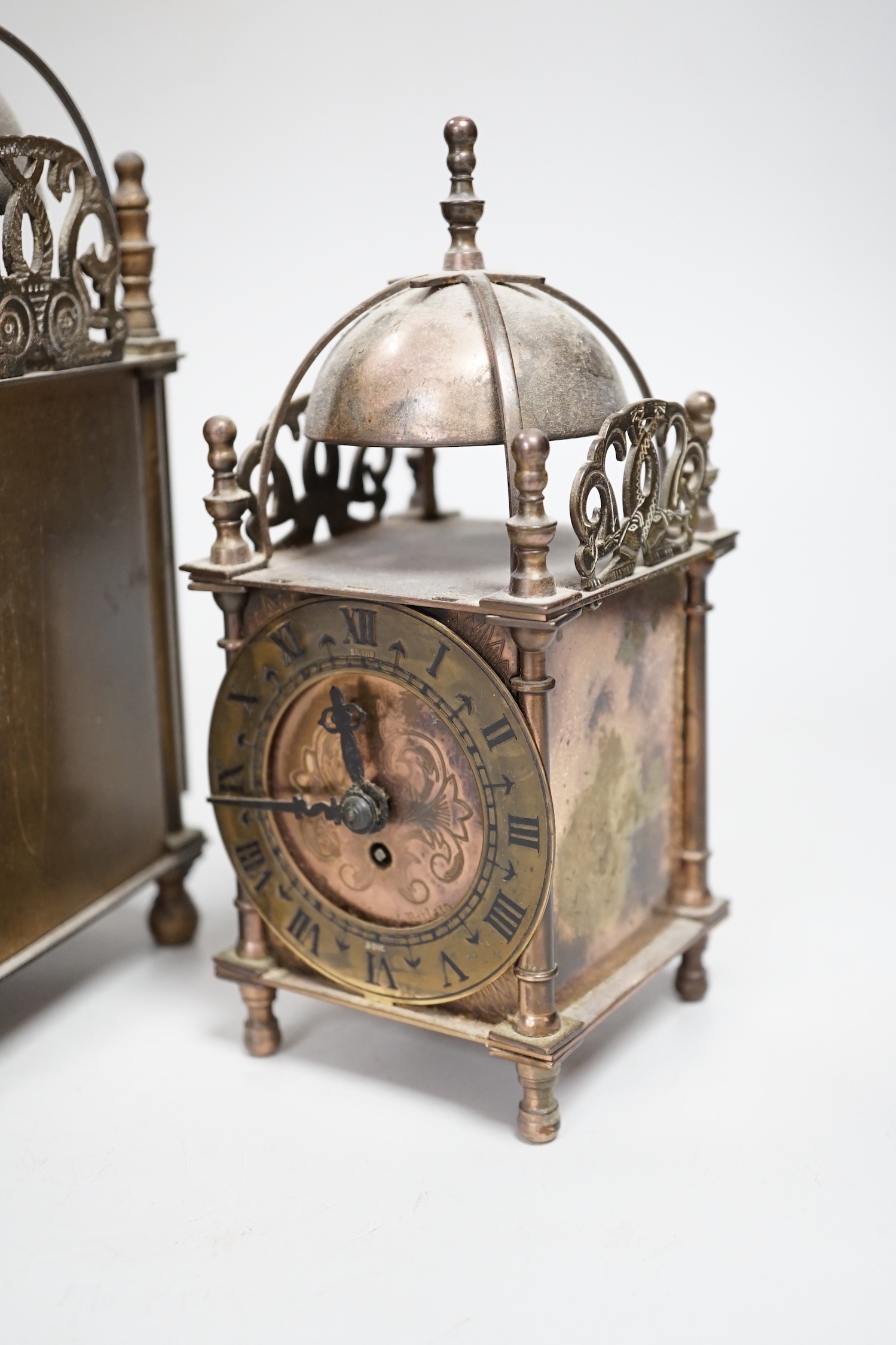 Two reproduction brass lantern clocks, tallest 24cm high